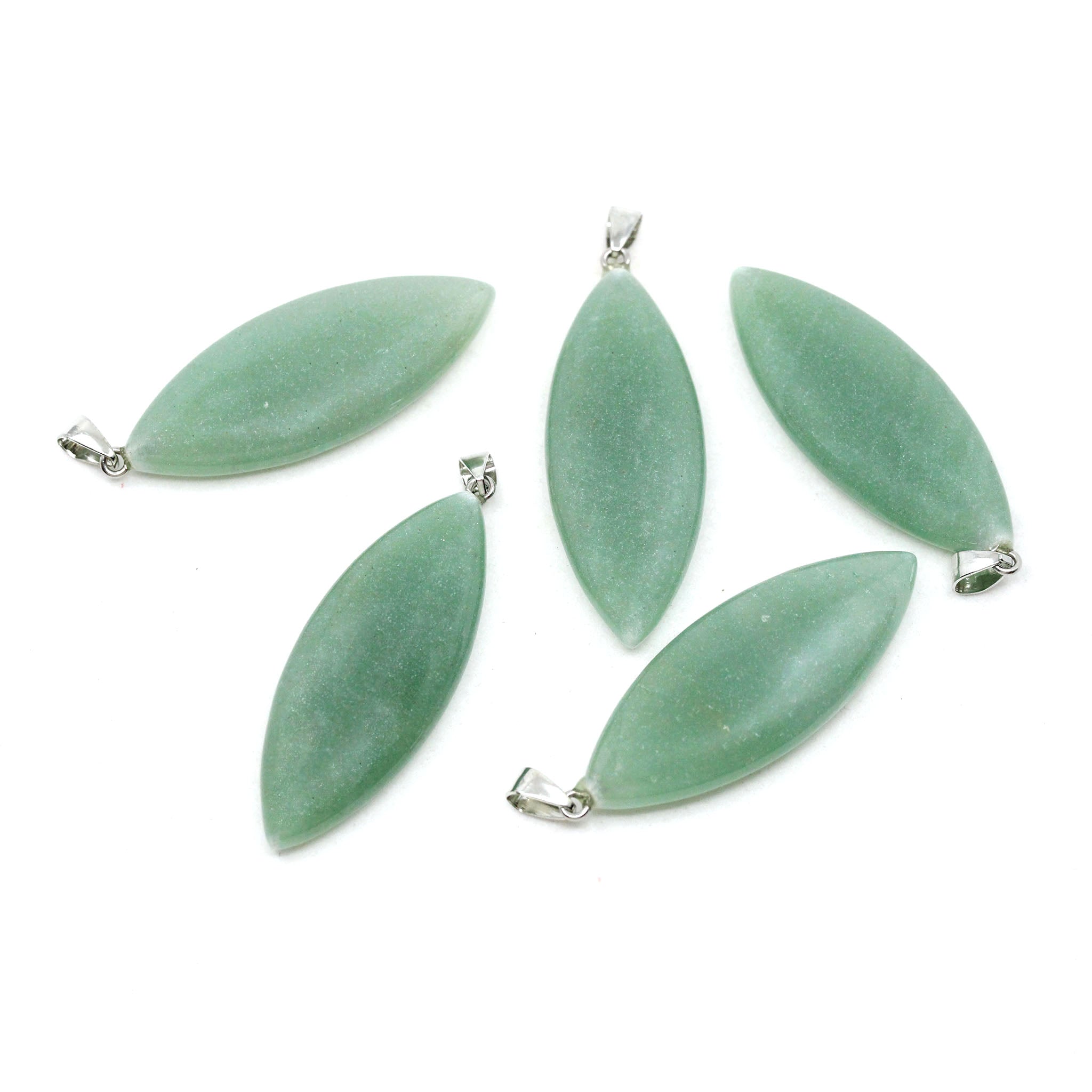 Five surfboard shaped pendants made from Green Aventurine on a white background. 