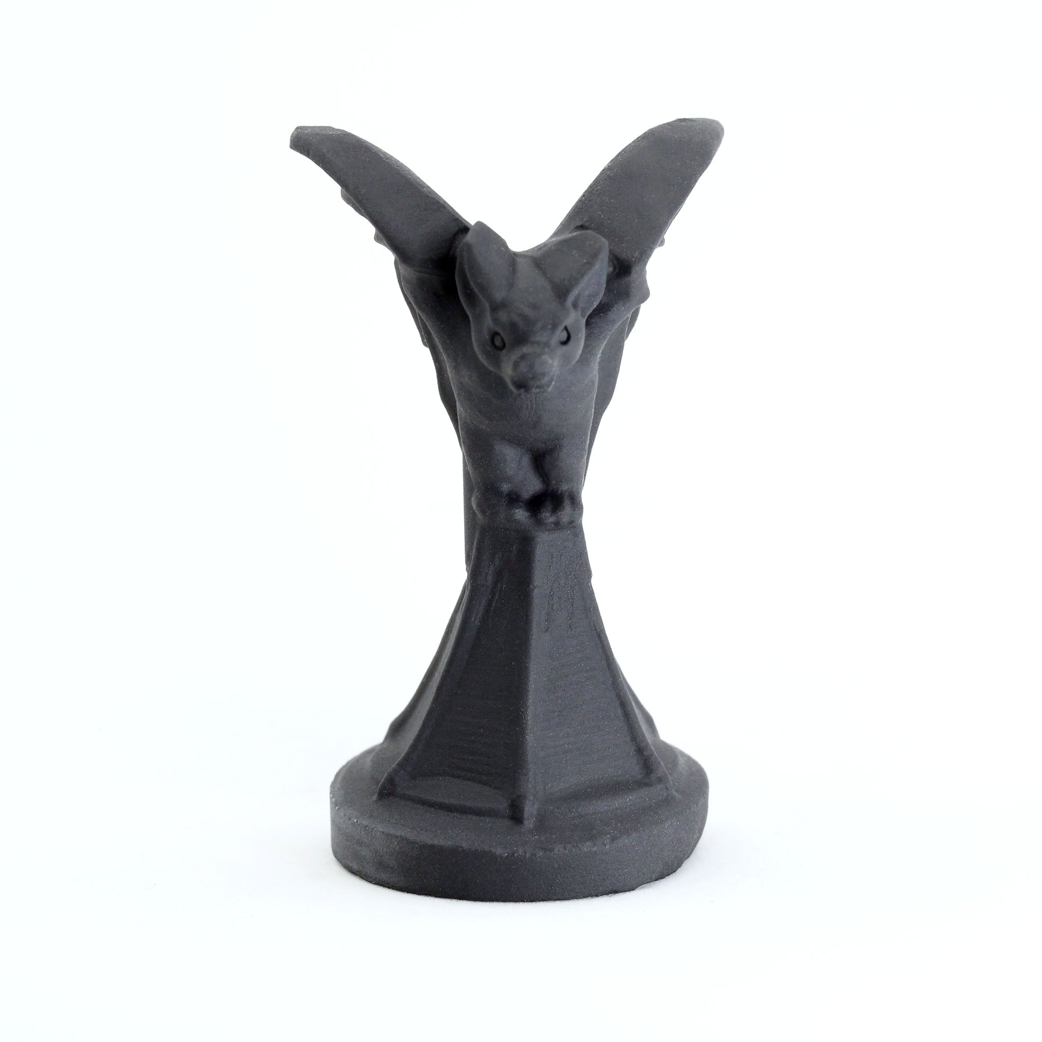 Bat Statue on Podium